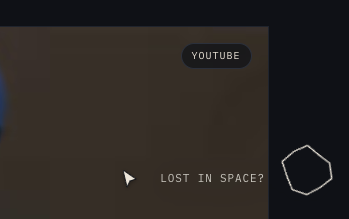 Floating asteroid icon at the bottom-right of the home page, with the "LOST IN SPACE?" hint chevron visible beside it.